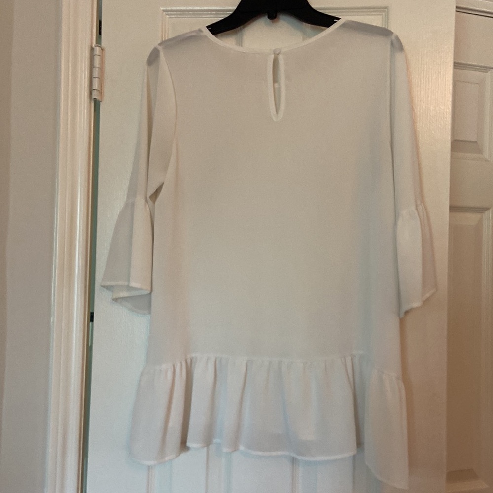 Cream blouse with flounce on sleeves and hem - Picture 4 of 5